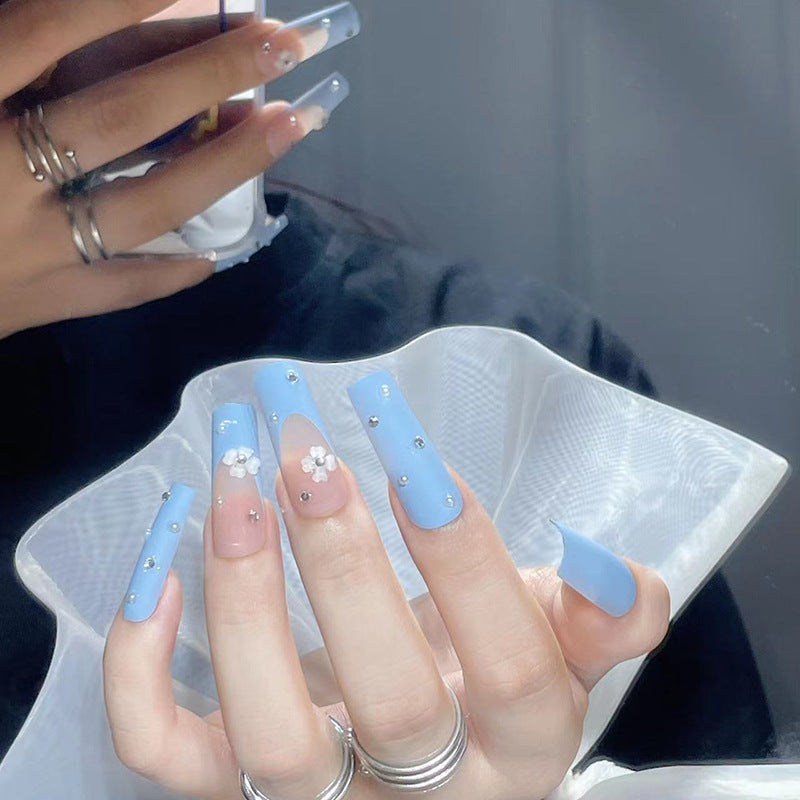 Enchanted Sky Long Coffin Light Blue Press On Nails with Floral Accents and Rhinestone Embellishments