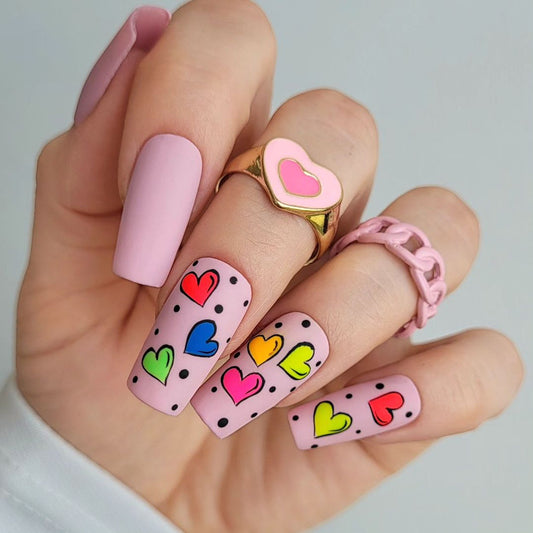 Sweetheart Charm Medium Coffin Baby Pink Press-On Nails with Colorful Heart Art for a Whimsical Flair