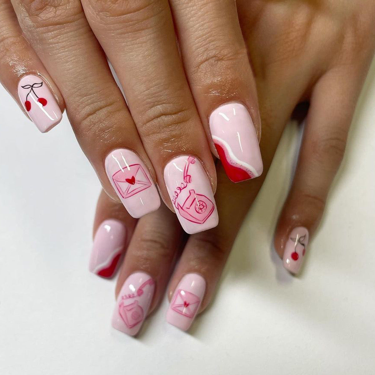 Love Letter Medium Square Soft Pink Press-On Nails with Romantic Red Accents and Playful Illustrations