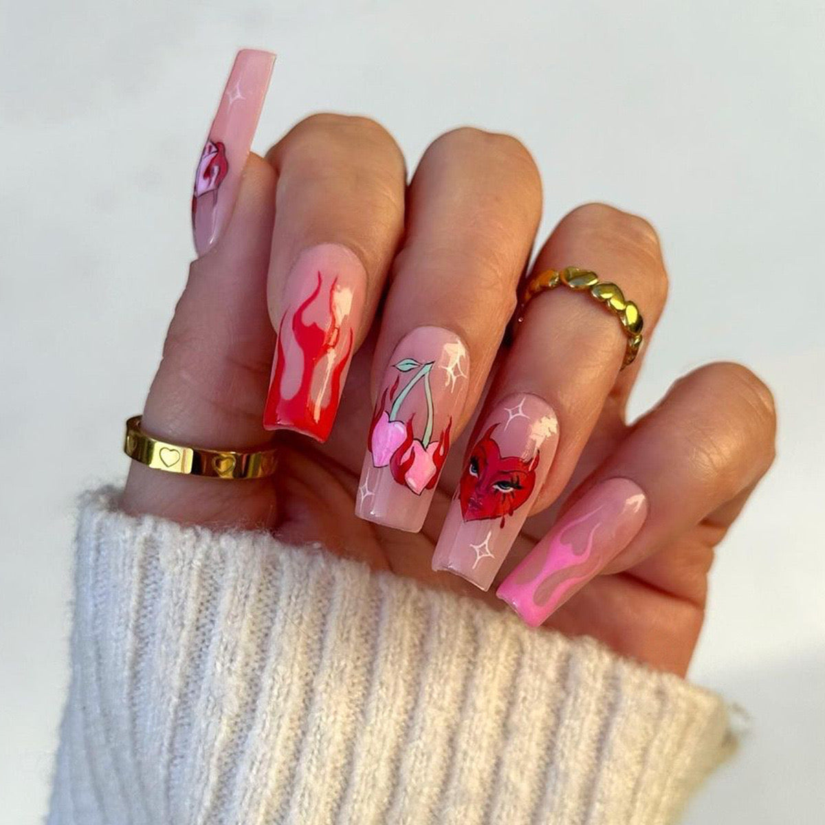 Sultry Siren Long Coffin Pink Press-On Nails with Seductive Flame and Face Art