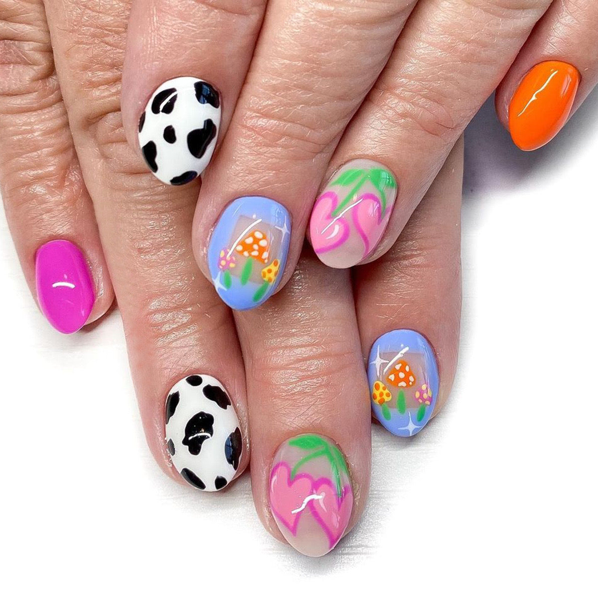 Funky Festival Medium Round Multicolor Press-On Nail Set with Animal Prints and Swirls