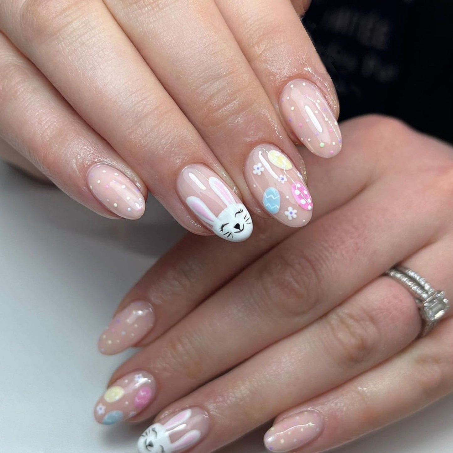 Easter Parade Medium Oval Pale Pink Press On Nails with Polka Dots and Bunny Motif Design