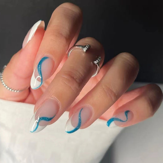 Arctic Wave Medium Almond White Press On Nail Set with Icy Blue Swirl Accents