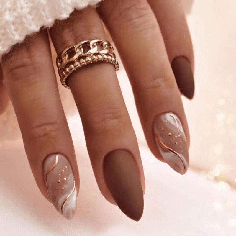 Boho Chic Medium Almond Press-On Nails in Matte Taupe with Accentuated Marbled Art Design