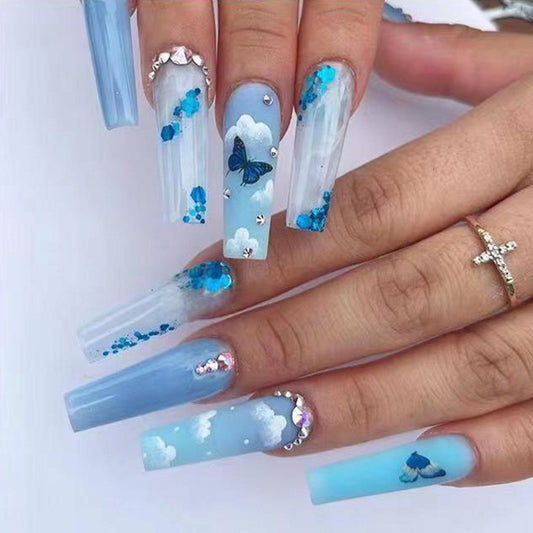 Serene Skies Extra Long Coffin Translucent with Sky Blue Gradient and Butterfly Accents Press On Nail Set