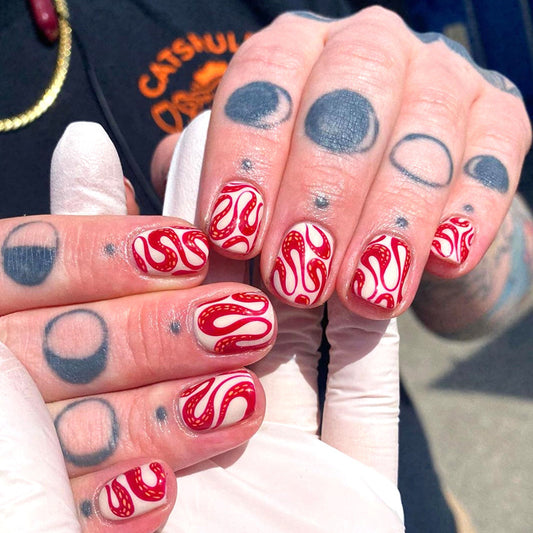 Snaking Around Medium Squoval Red Marble Press On Nails