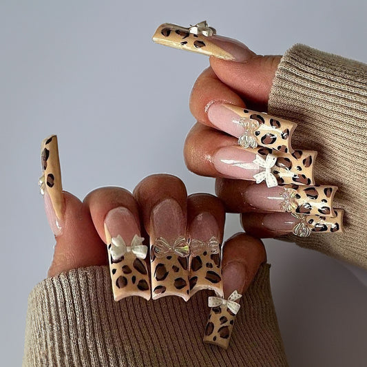 Safari Glamour Long Square Press-On Nails in Beige with Leopard Print, Crystals, and Bow Details