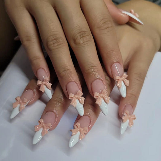 Whimsical Charm Medium Almond Press-On Nails with White Tips and Peach Bow Accents