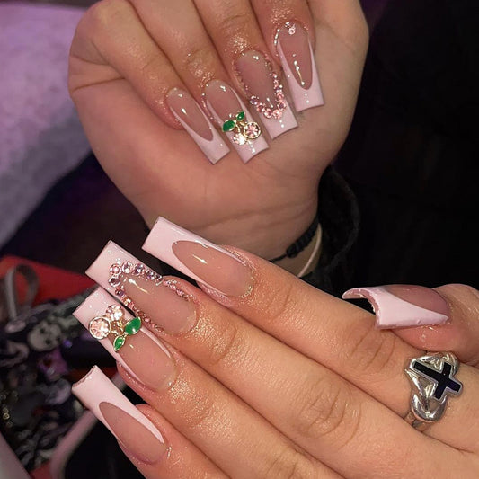 Luxurious Long Coffin Pink and White Ombre Press-On Nails with Green Gemstone Accents and Glitter Detail