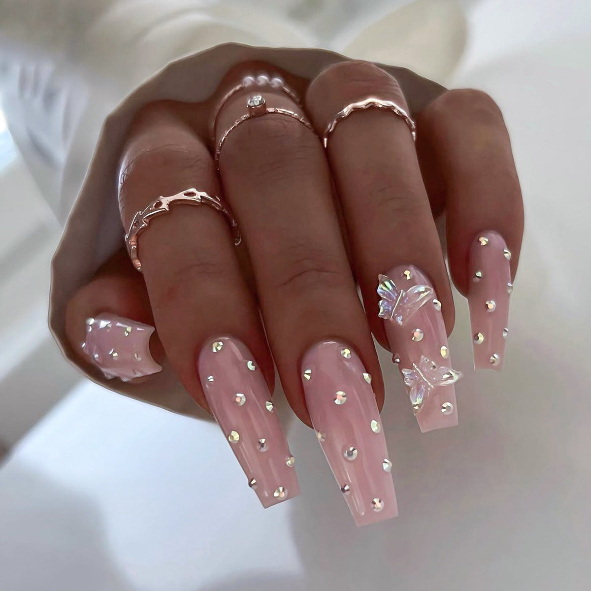 Crystal Elegance Long Coffin Press On Nails in Soft Pink with Gold Studs and Butterfly Accents