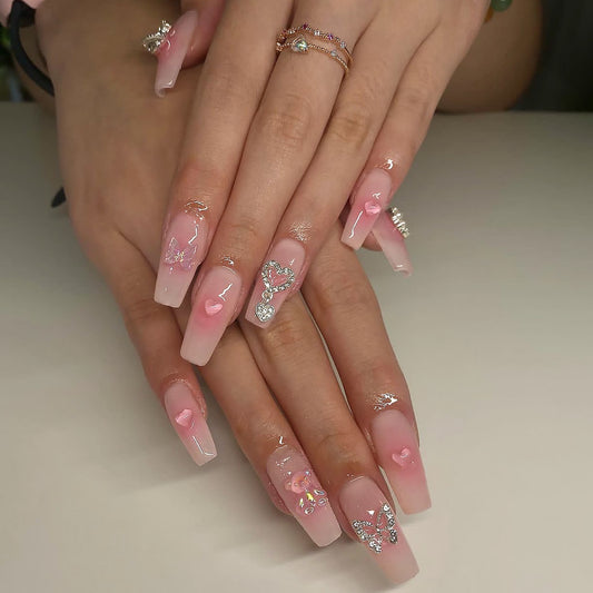 Enchanted Romance Extra Long Coffin Press-On Nails with Pink Fade, Glitter Accents, and Butterfly Charms