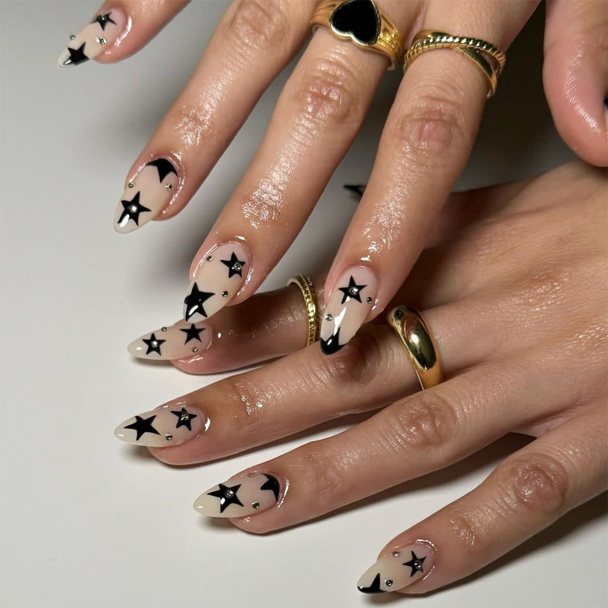 Chic Long Almond Beige Press-On Nails with Black Star and Moon Design