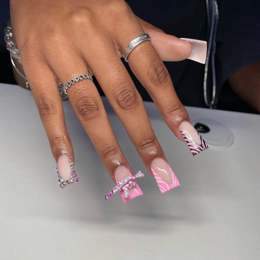 Bold Long Duck Pink and White Press-On Nails with Zebra Pattern and Crystal Bow Accents