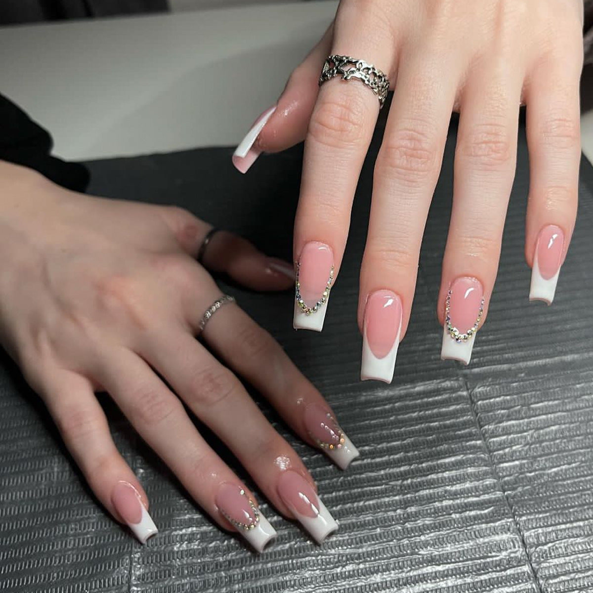 Glittering Crescent Chic: Long Square French Tip Press-On Nails with Rhinestone Embellishments