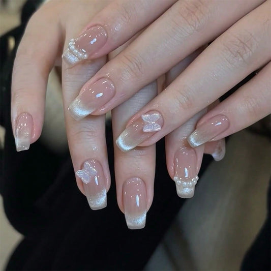 Serene Sparkle Medium Coffin Beige and Glitter Gradient Press-On Nails with Delicate Butterfly Accents