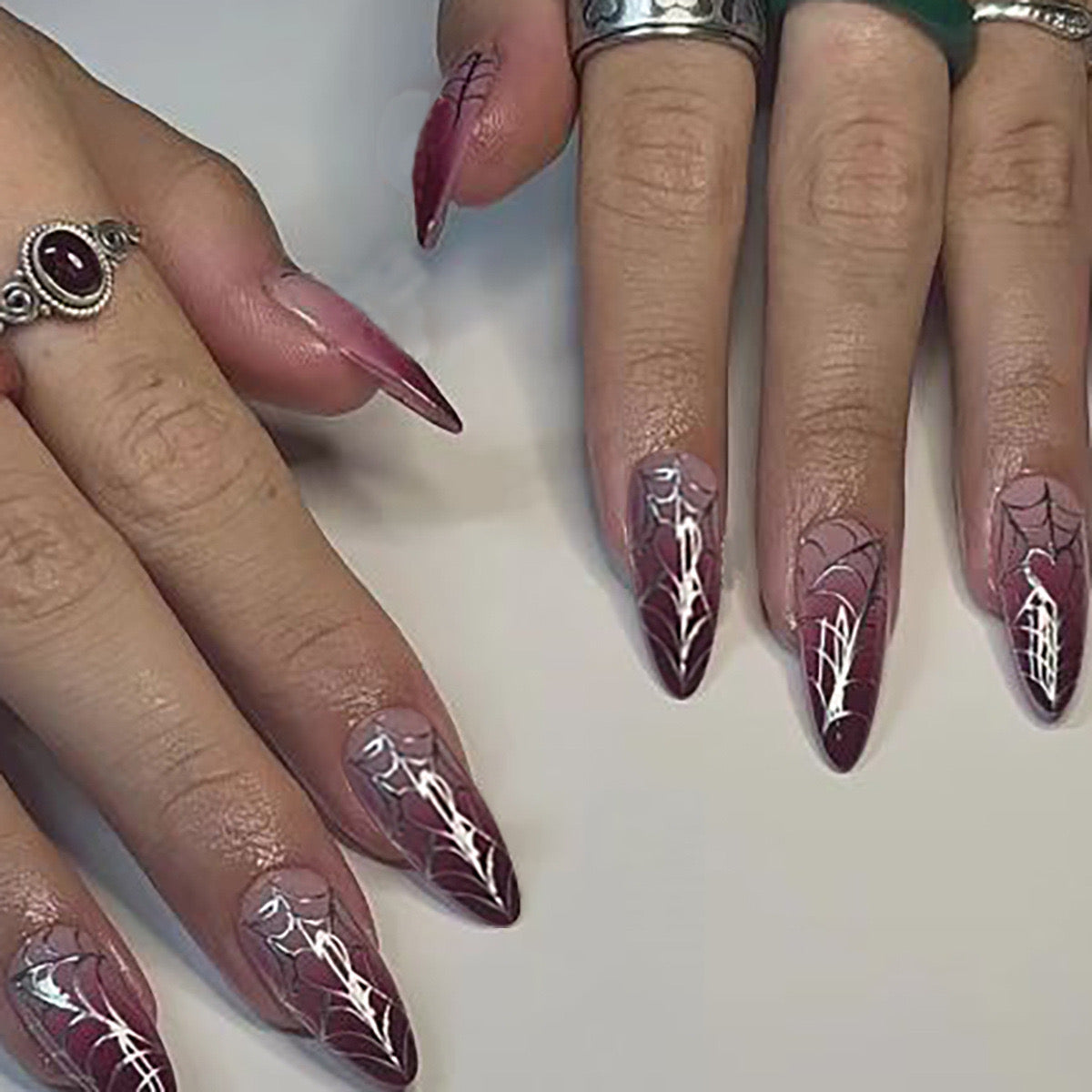 Gothic Glamour Long Stiletto Maroon Press-On Nails with Spiderweb Art and Silver Accents