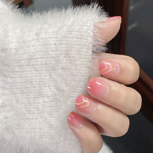 Elegant Romance Medium-Length Squoval Peach Press On Nails with Gold Accent Detail