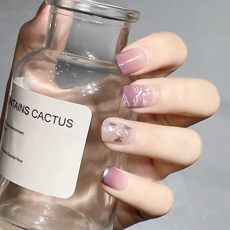 Enchanted Garden Medium Length Squoval Shape Pastel Pink Press On Nail Set with Floral Accents and Glitter Highlights