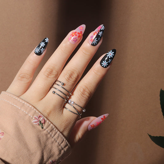 Enchanted Floral Fantasy Medium Almond Black and Pink Press-On Nails with Daisy Accents