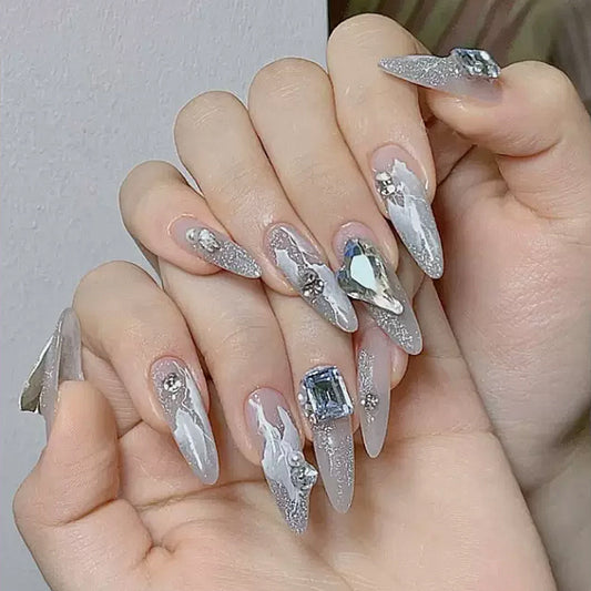 Icy Elegance Extra-Long Stiletto Clear Press-On Nail Set with Silver Glitter and Jewel Accents