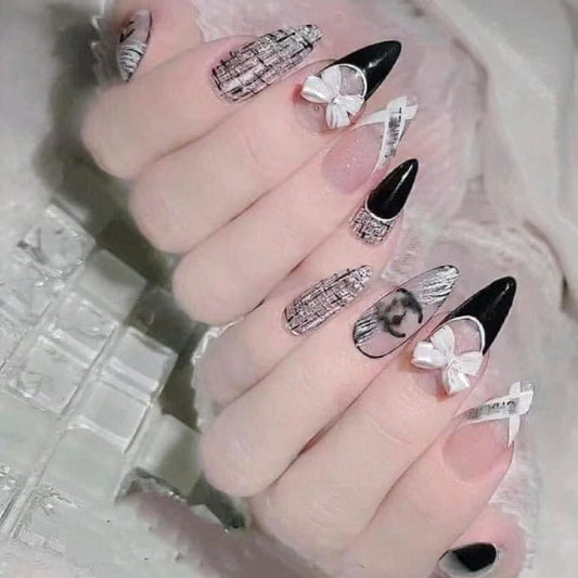 Gothic Elegance Extra Long Almond Black and White Press-On Nails with Newspaper Print and Bow Accents