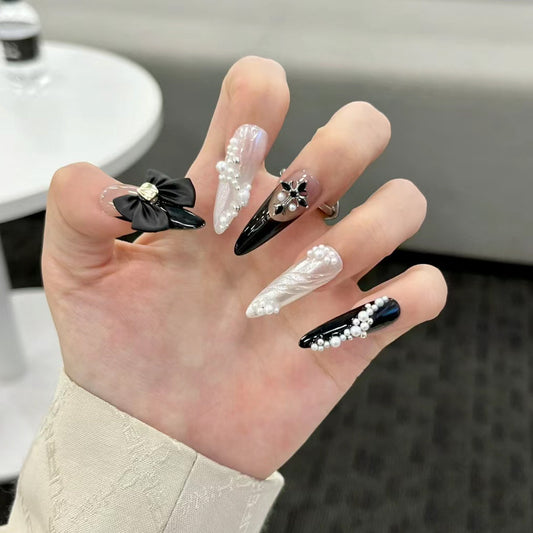Monochrome Majesty Extra-Long Stiletto Black and White Press-On Nail Set with Pearl and Bow Embellishments
