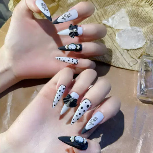 Vintage Charm Long Stiletto Black and White Press-On Nail Set with Polka Dots, Bows, and Gem Accents