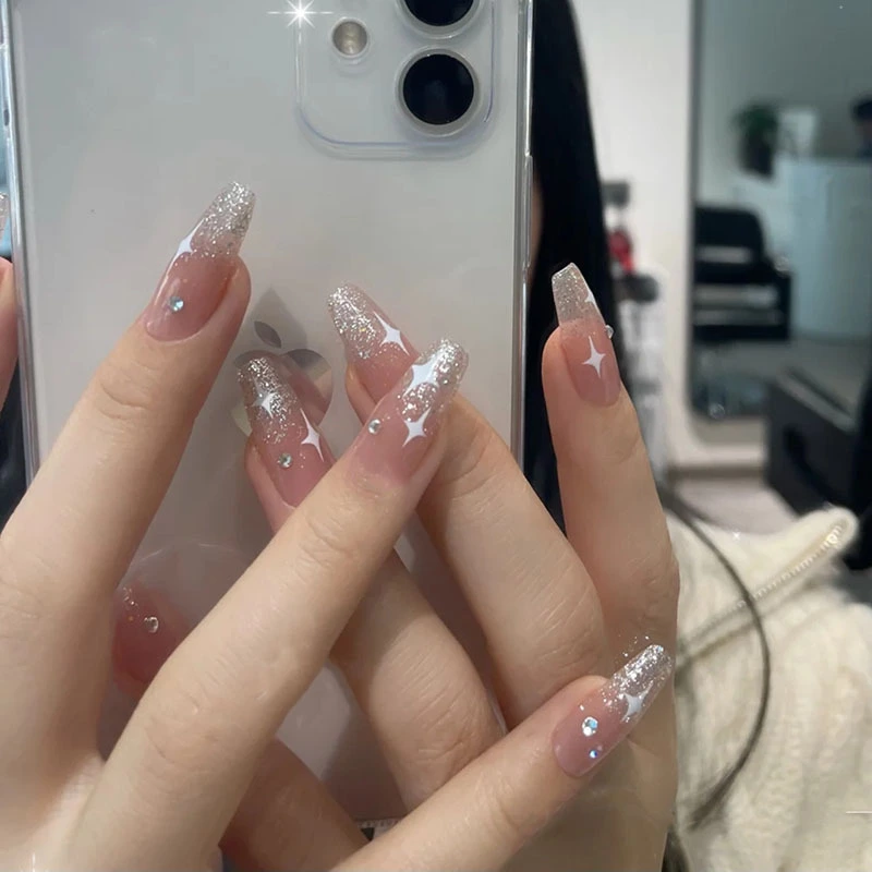 Winter Sparkle Long Coffin Press on Nail Set in Sheer Pink with Glitter Fade and Rhinestone Accents
