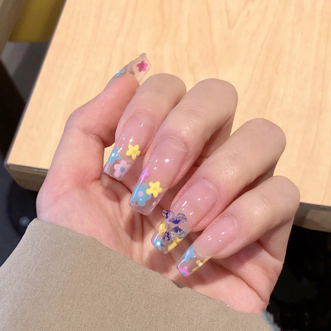 Spring Blossom Long Coffin Press on Nail Set in Sheer Pink with Pastel Flower Accents and Butterfly Charm