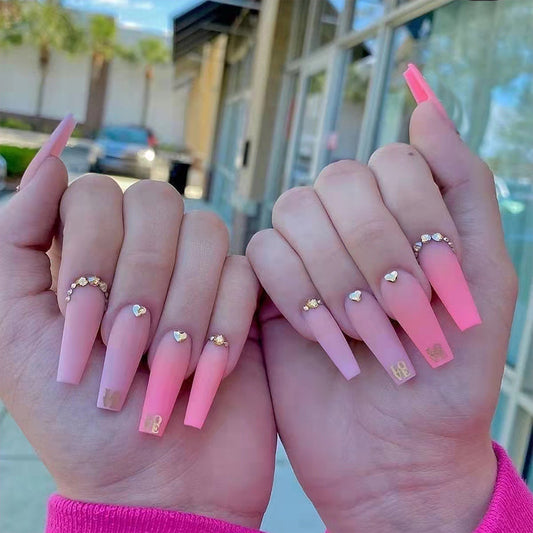 Candy Crush Extra Long Coffin Press on Nail Set in Gradient Pink with Golden Rhinestone Embellishments and Letter Accents