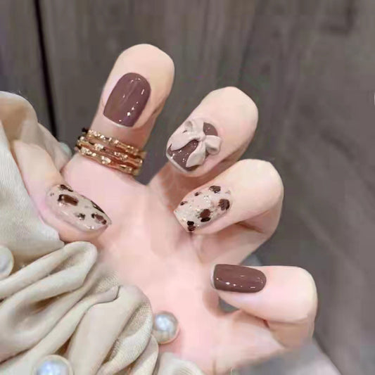 Cozy Cocoa Short Square Press on Nail Set in Mocha with Glitter Accents and Bow Design