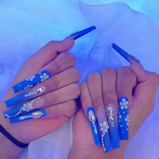 Sapphire Elegance Extra Long Coffin Press on Nail Set in Matte Royal Blue with Floral Designs and Crystal Embellishments