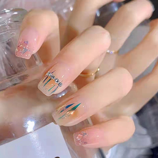 Elegant Sparkle Short Squoval Beige Press On Nails with Silver Glitter Accents