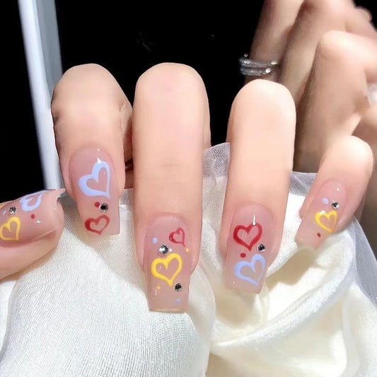 Loving Whispers Long Square Beige Press-On Nail Set with Multicolor Heart Designs and Rhinestone Embellishments