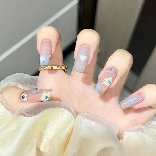 Cloudy Daydream Medium Square Sky Blue Press On Nails with White Hearts and Floral Embellishments