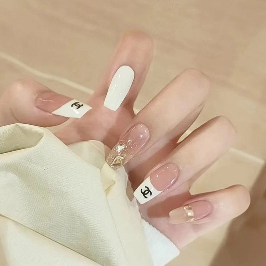 Designer Chic Long Coffin White And Beige Press On Nail Set With Logo Accents And Rhinestone Embellishments