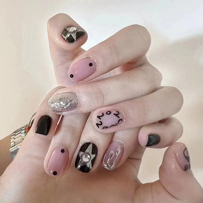 Playful Punk Short Squoval Black and Pink Press On Nail Set with Silver Studs and Cartoon Accents
