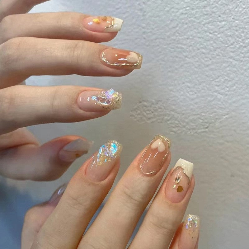 Enchanting Medium Square Beige Press On Nails with Iridescent Glitter Accents and Delicate Heart Detailing