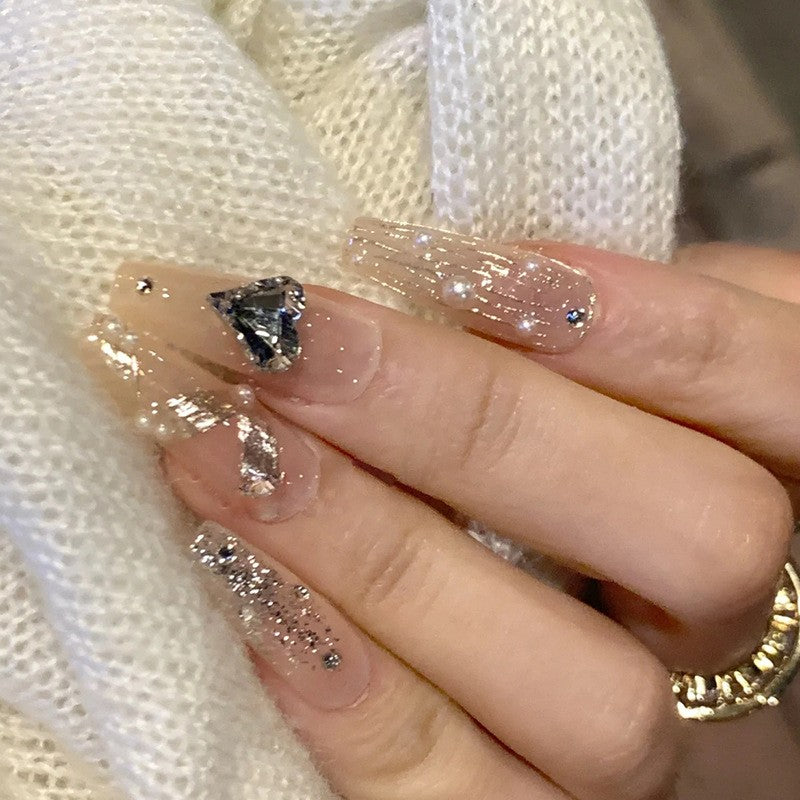 Diamond Dazzle Long Coffin Clear Press-On Nails with Sparkling Glitter and Bold Black Gem Accent