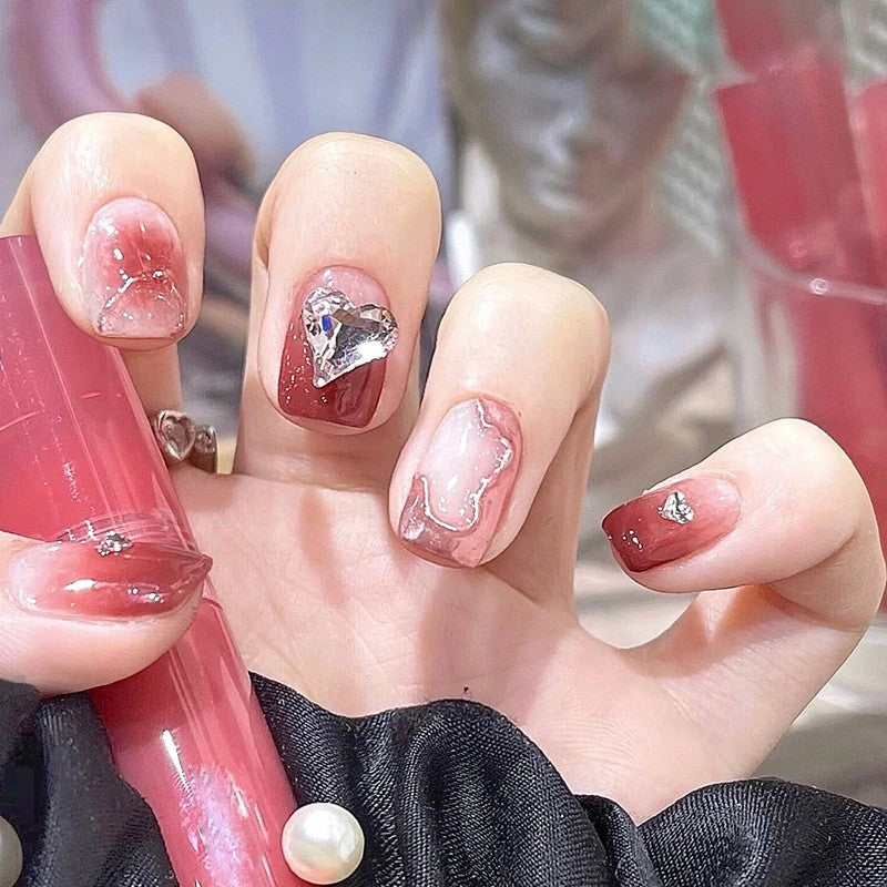 Glossy Romance Short Square Pink Press-On Nails with Marble Effect and Silver Heart Gem Accents